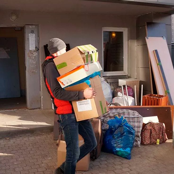 Local movers packing furniture in Al Barsha Dubai apartment