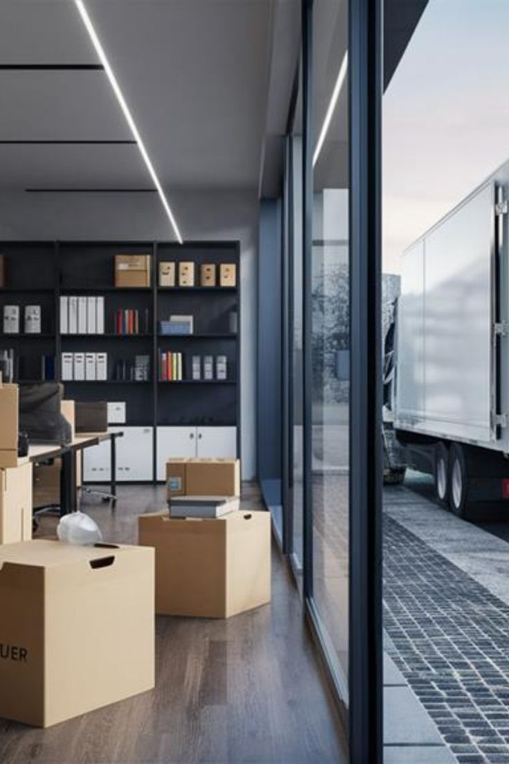 office movers in Dubai loading commercial furniture